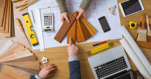 client choosing wood floor samples spring preparation and home permits for projects